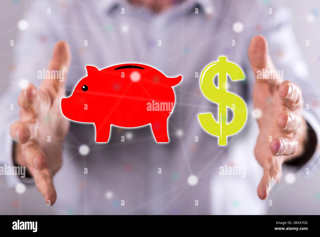 Money saving concept between hands of a man in background Stock Photo