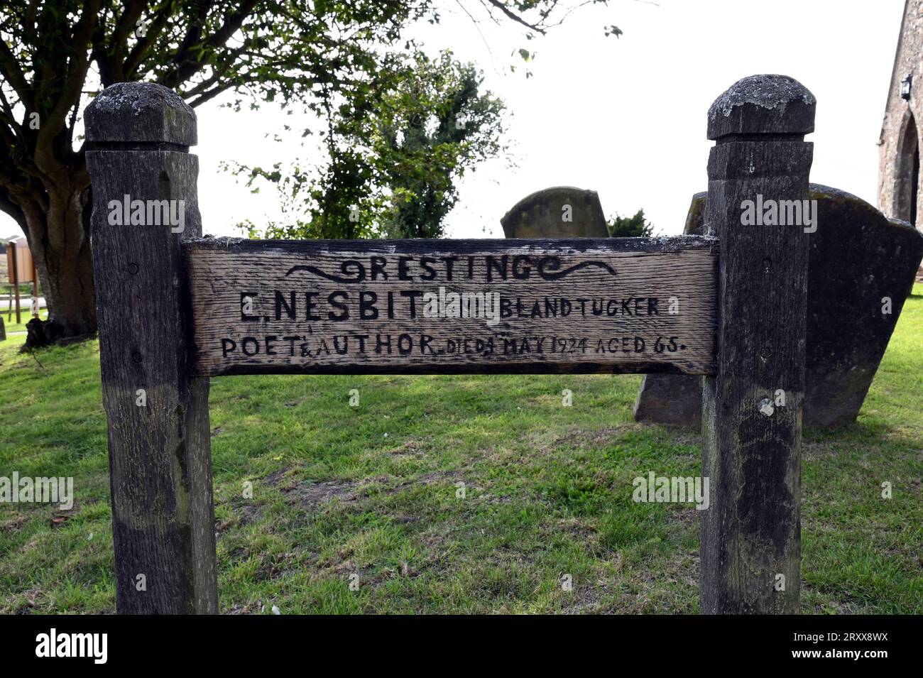 Memorial to the children's author E Nesbit. She died on 4th May 1924 aged 65 and is buried at the church of St Mary the Virgin, St Mary in the Marsh. Stock Photo