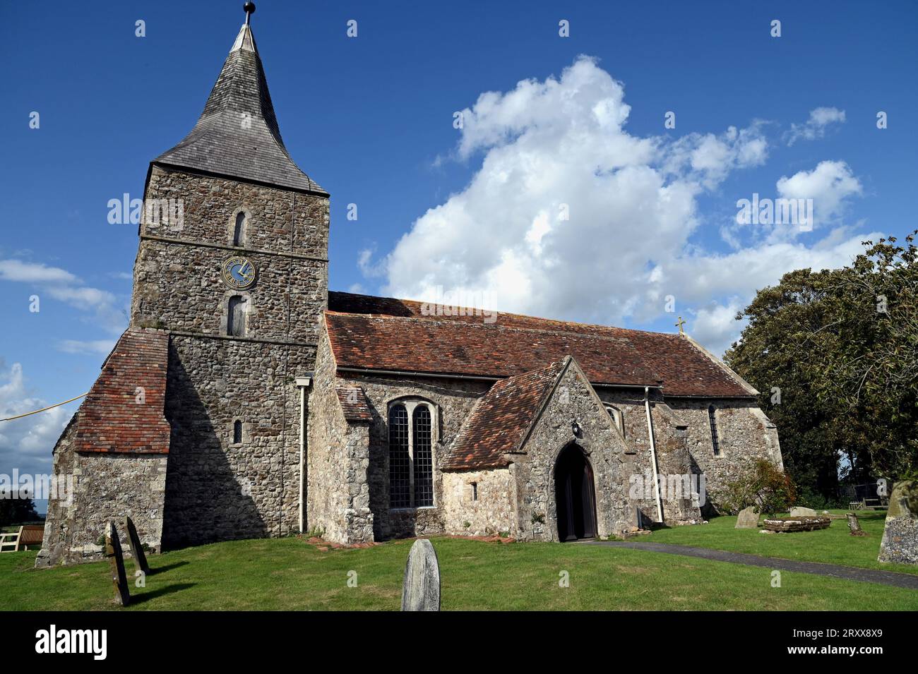 The church of St Mary the Virgin, St Mary in the Marsh, Romney Marsh, Kent. E Nisbet, the children's author, is buried and commemorated there. Stock Photo