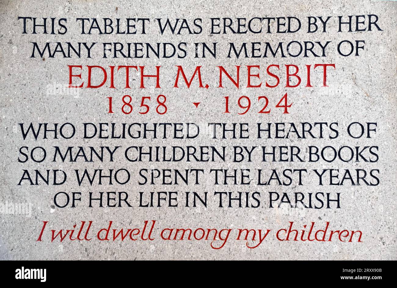 Memorial to the children's author E Nesbit. She died on 4th May 1924 aged 65 and is buried at the church of St Mary the Virgin, St Mary in the Marsh. Stock Photo