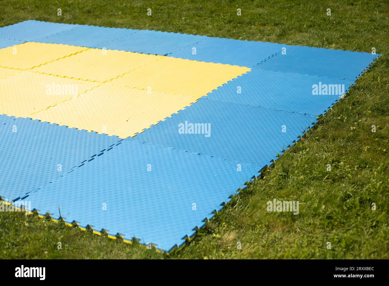 Sports mats for outdoor workouts. Soft workout coating. Fitness area