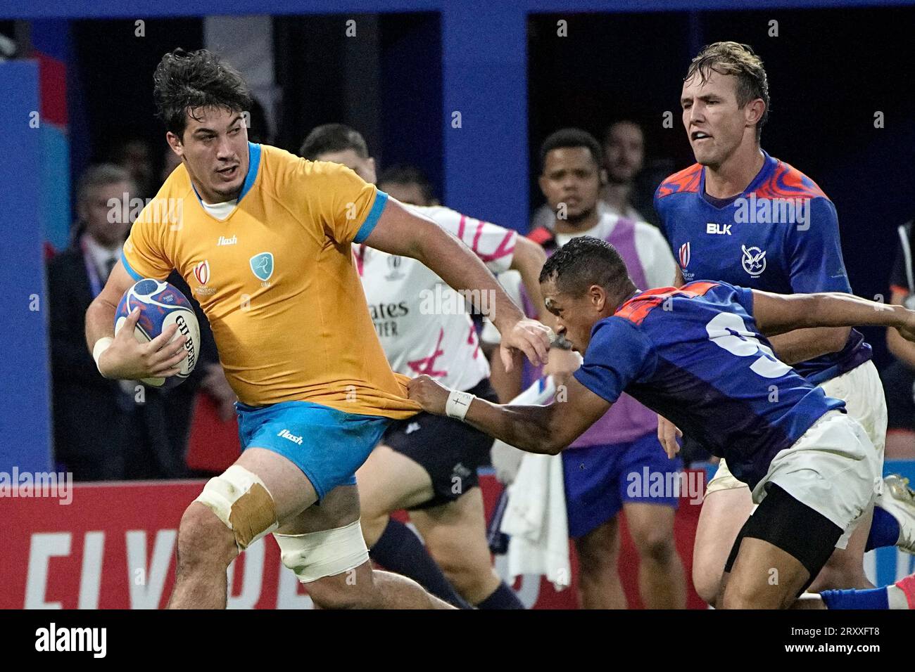 Uruguay's Carlos Deus evades Namibia's Damian Stevens during the Rugby  World Cup Pool A match between Uruguay and Namibia at the OL Stadium in  Lyon, France, Wednesday, Sept. 27, 2023. (AP Photo/Laurent