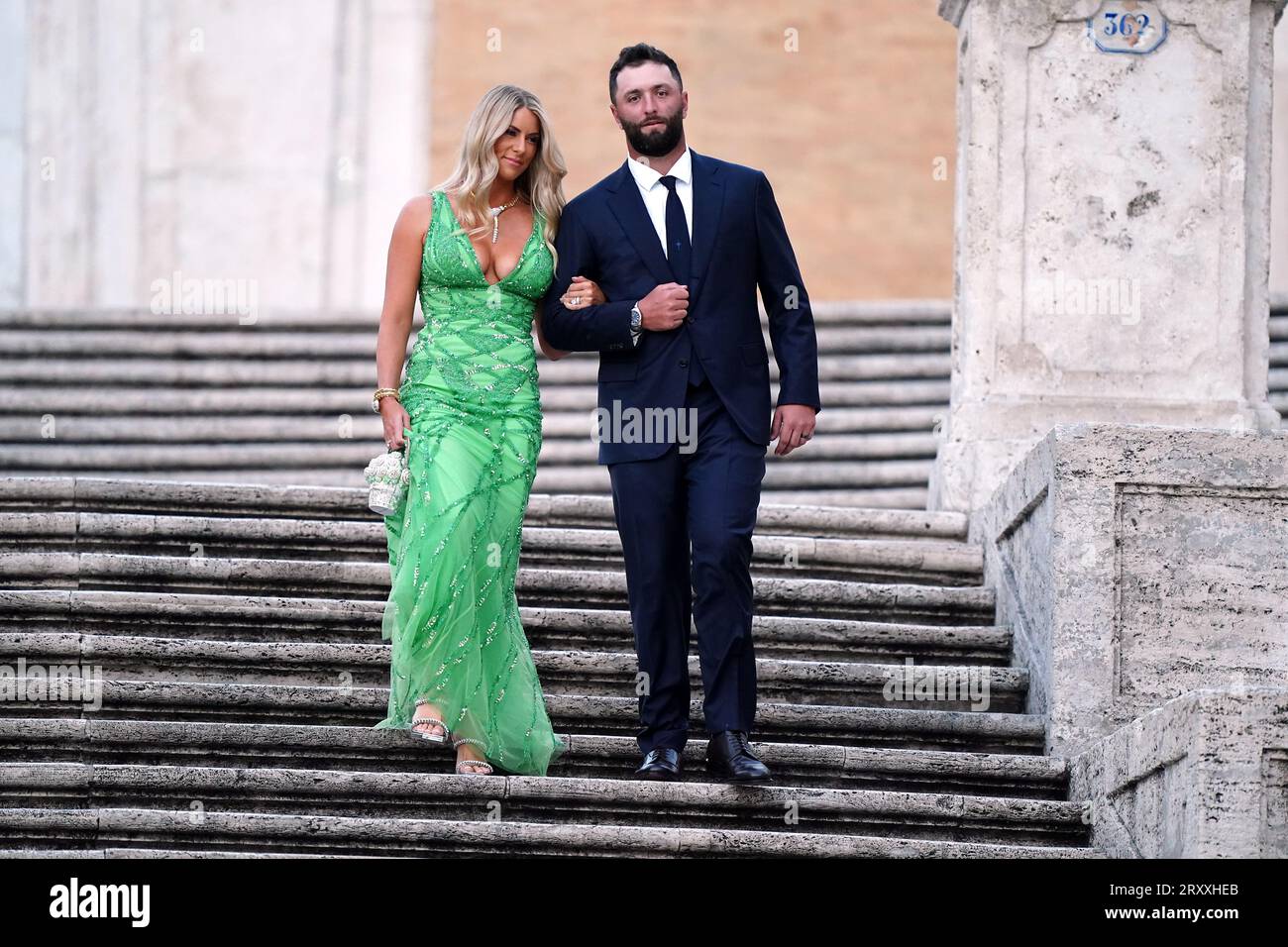Team Europe's Jon Rahm and partner Kelley Cahill at the Spanish Steps of Rome, Italy, ahead of the 2023 Ryder Cup. Picture date: Wednesday September 27, 2023. Stock Photo