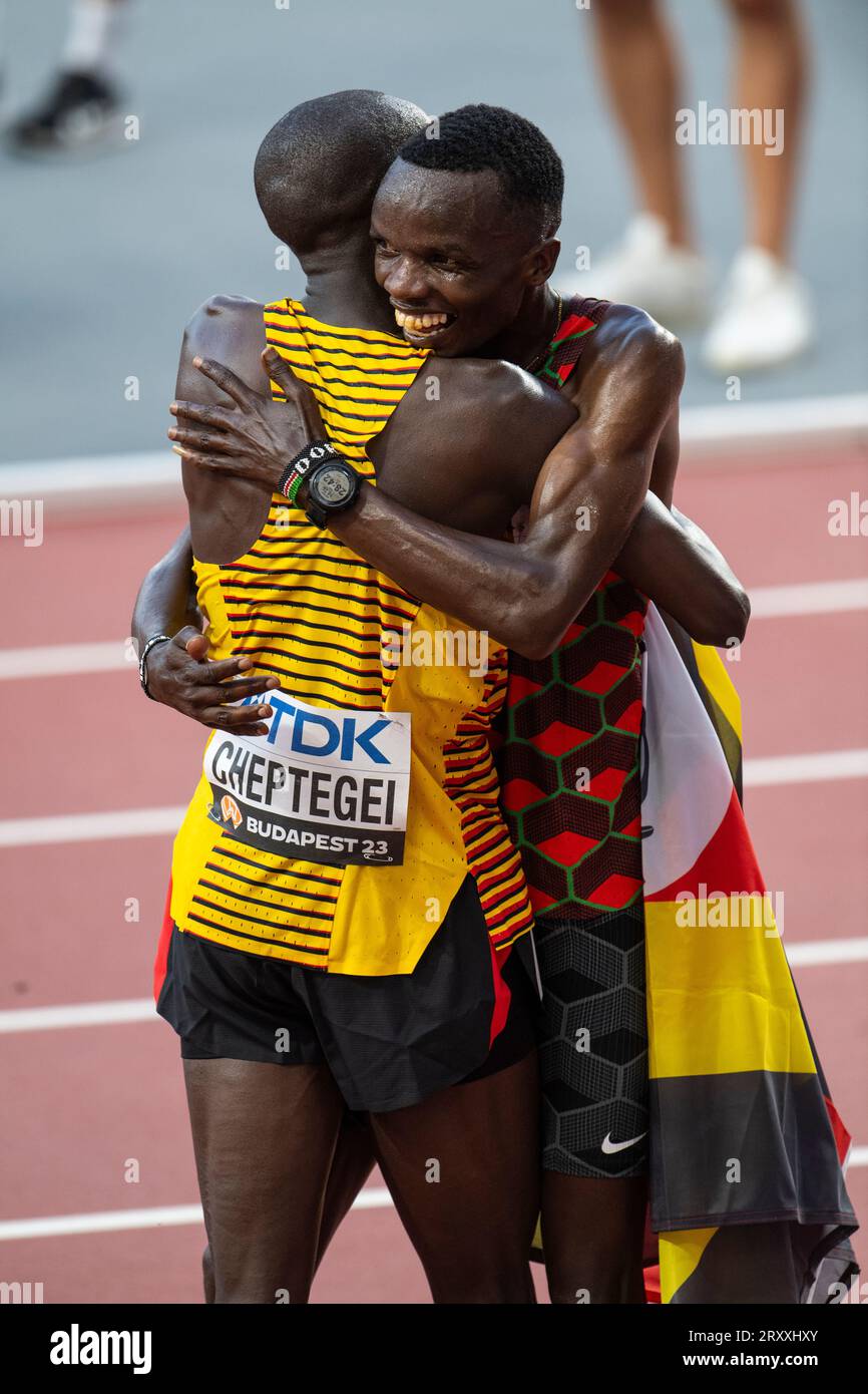 Joshua Cheptegei of Uganda and Daniel Simiu Ebenyo of Kenya celebrate after  competing in the 10000m final at the World Athletics Championships at the  Stock Photo - Alamy