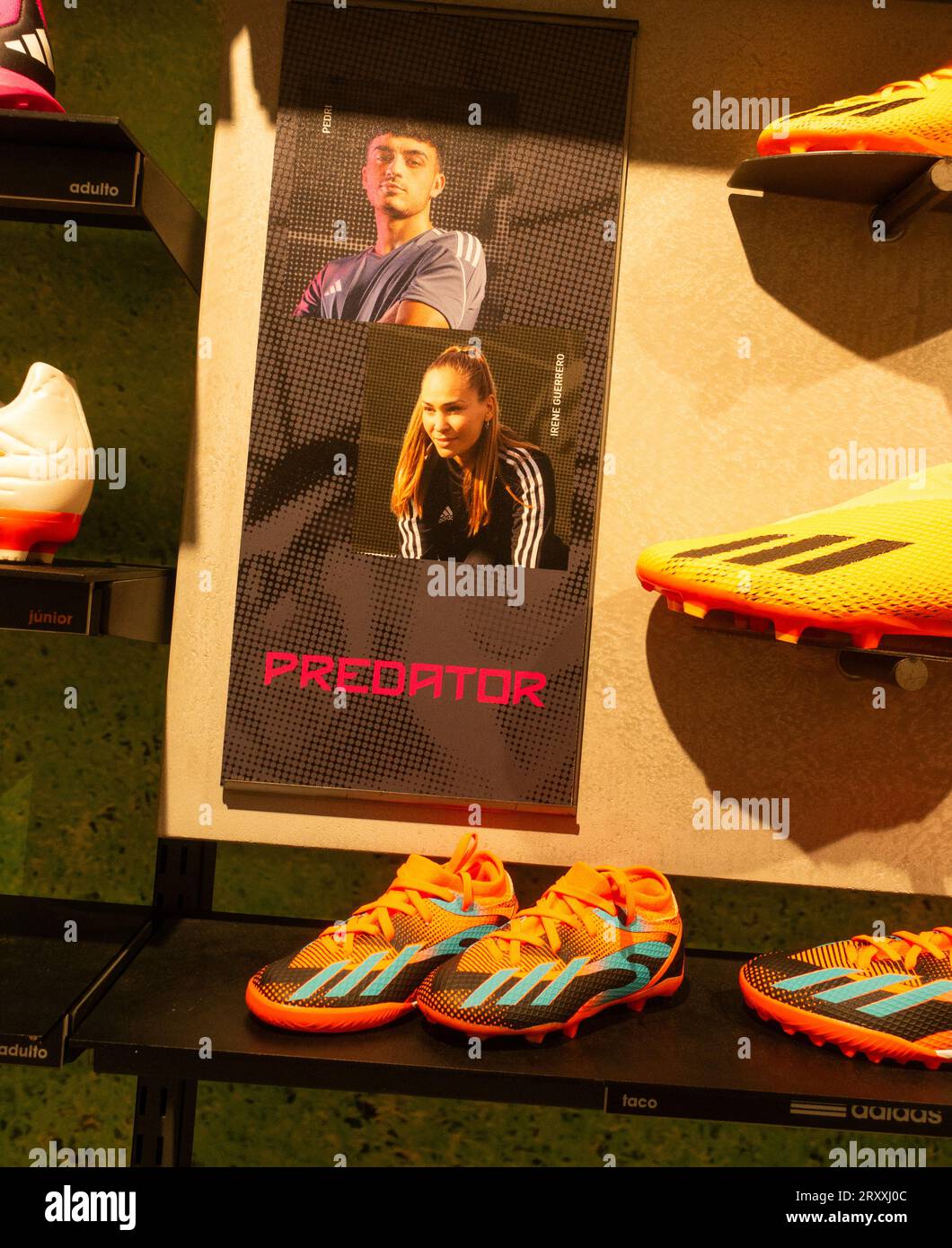 Adidas Predator football boots store display featuring Spanish International footballer, Irene Guerrero Stock Photo