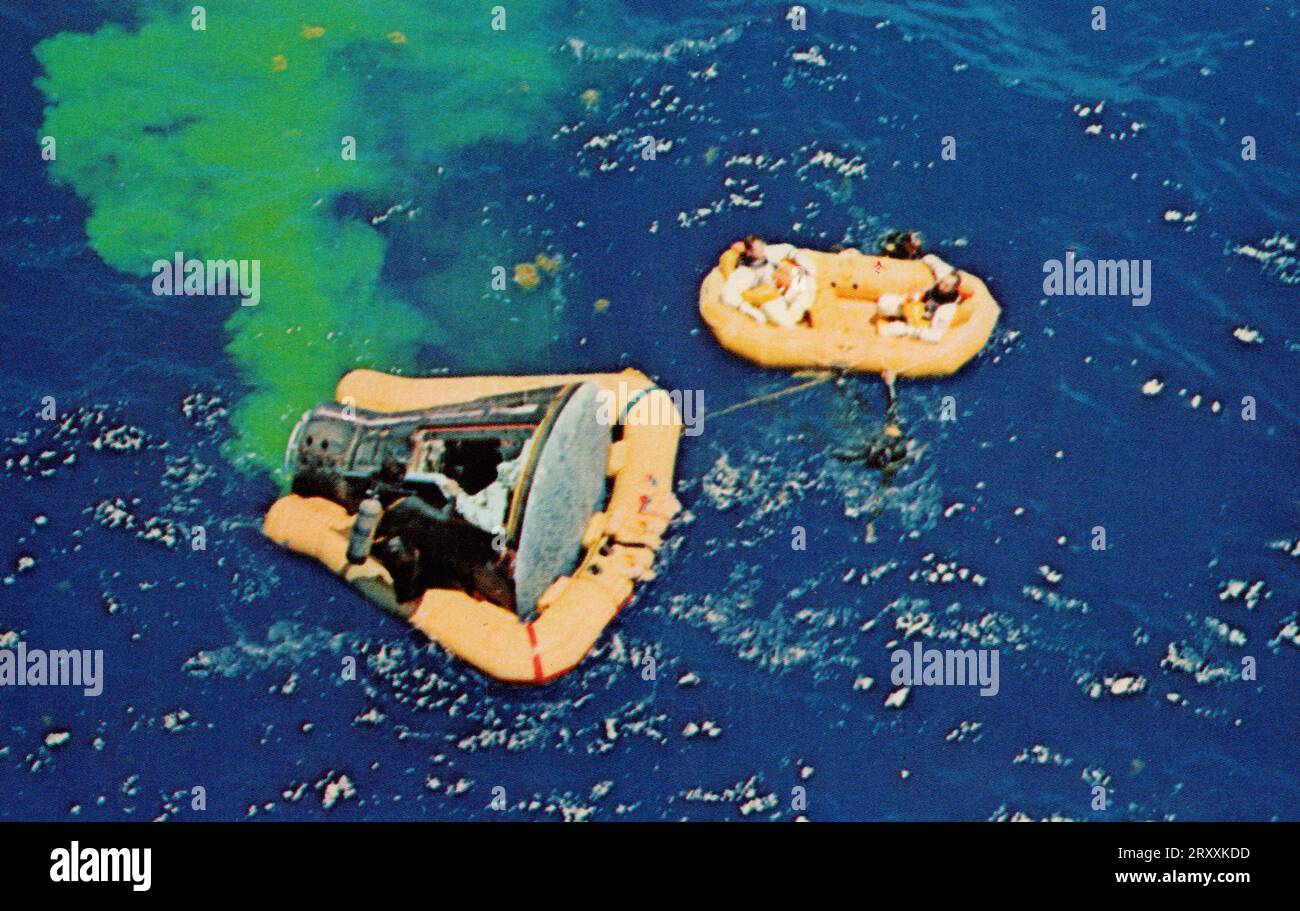 Astronauts James McDivitt and Ed White float alongside Gemini 4 spacecraft, 1965 lithograph postcard Stock Photo
