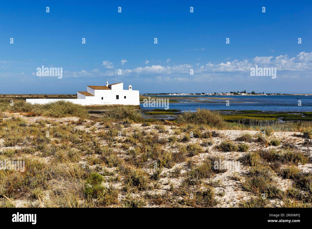 Tidal mill, dune landscape, salt marshes, Quinta de marim, Ria Formosa nature park Park, Olhao, Olhao, Algarve, Portugal Stock Photo