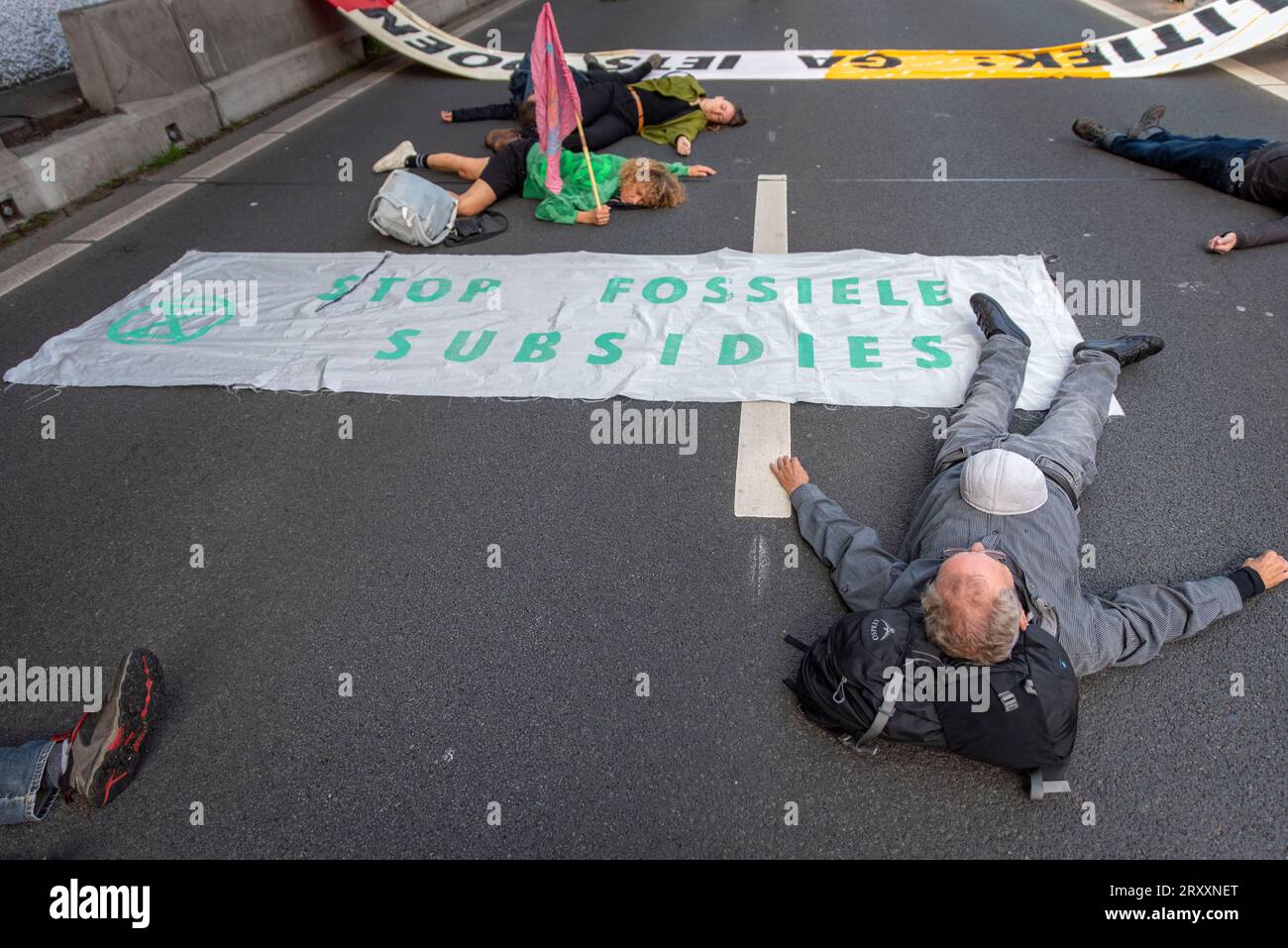 September 27, 2023, The Hague, South Holland, Netherlands: On 27 September, 2023, Extinction Rebellion Activists perform a ''Die-In'' on the A12 Highway in The Hague. The activists are protesting against the Dutch government's subsidies and tax breaks to the fossil fuel industry. (Credit Image: © James Petermeier/ZUMA Press Wire) EDITORIAL USAGE ONLY! Not for Commercial USAGE! Stock Photo