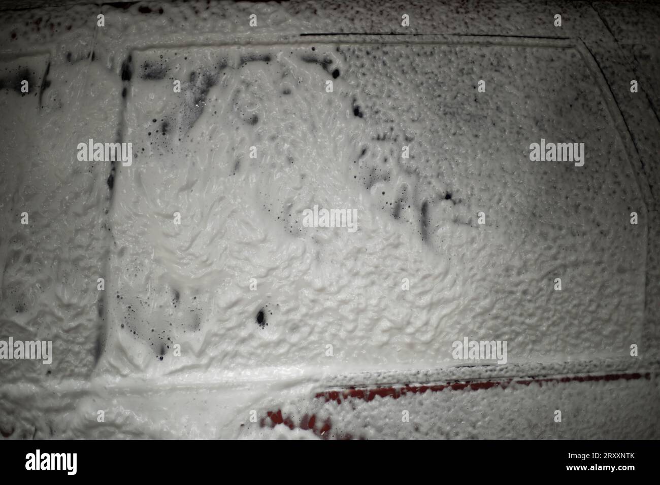 Soap suds on car window in car wash hires stock photography and images