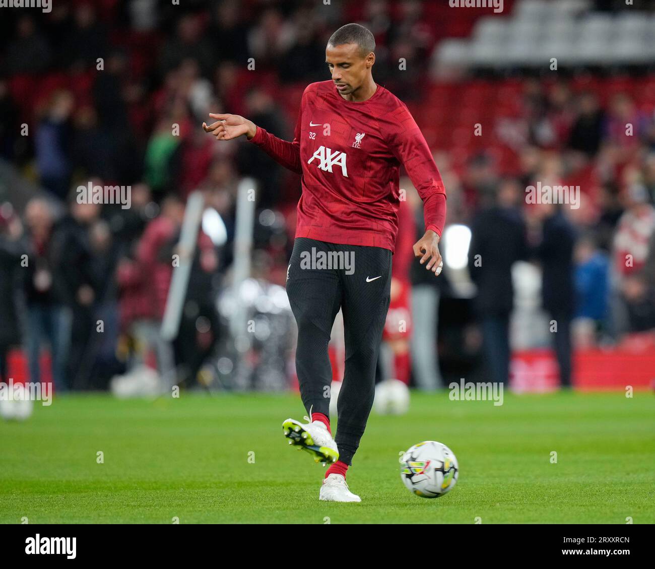 Joel Matip #32 of Liverpool warms up before the Carabao Cup Third Round match Liverpool vs Leicester City at Anfield, Liverpool, United Kingdom, 27th September 2023  (Photo by Steve Flynn/News Images) Stock Photo