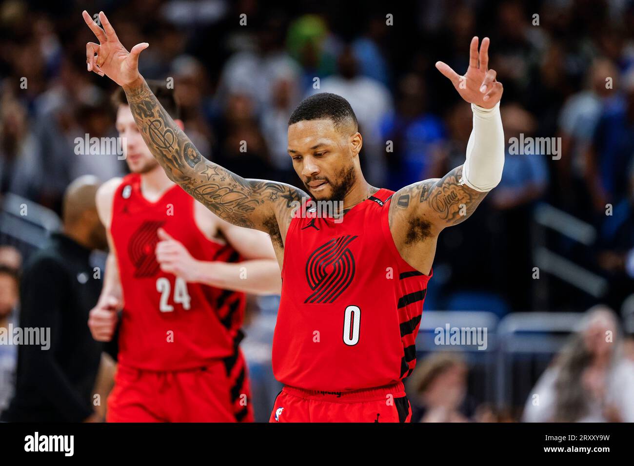 FILE Portland Trail Blazers guard Damian Lillard (0) celebrates after