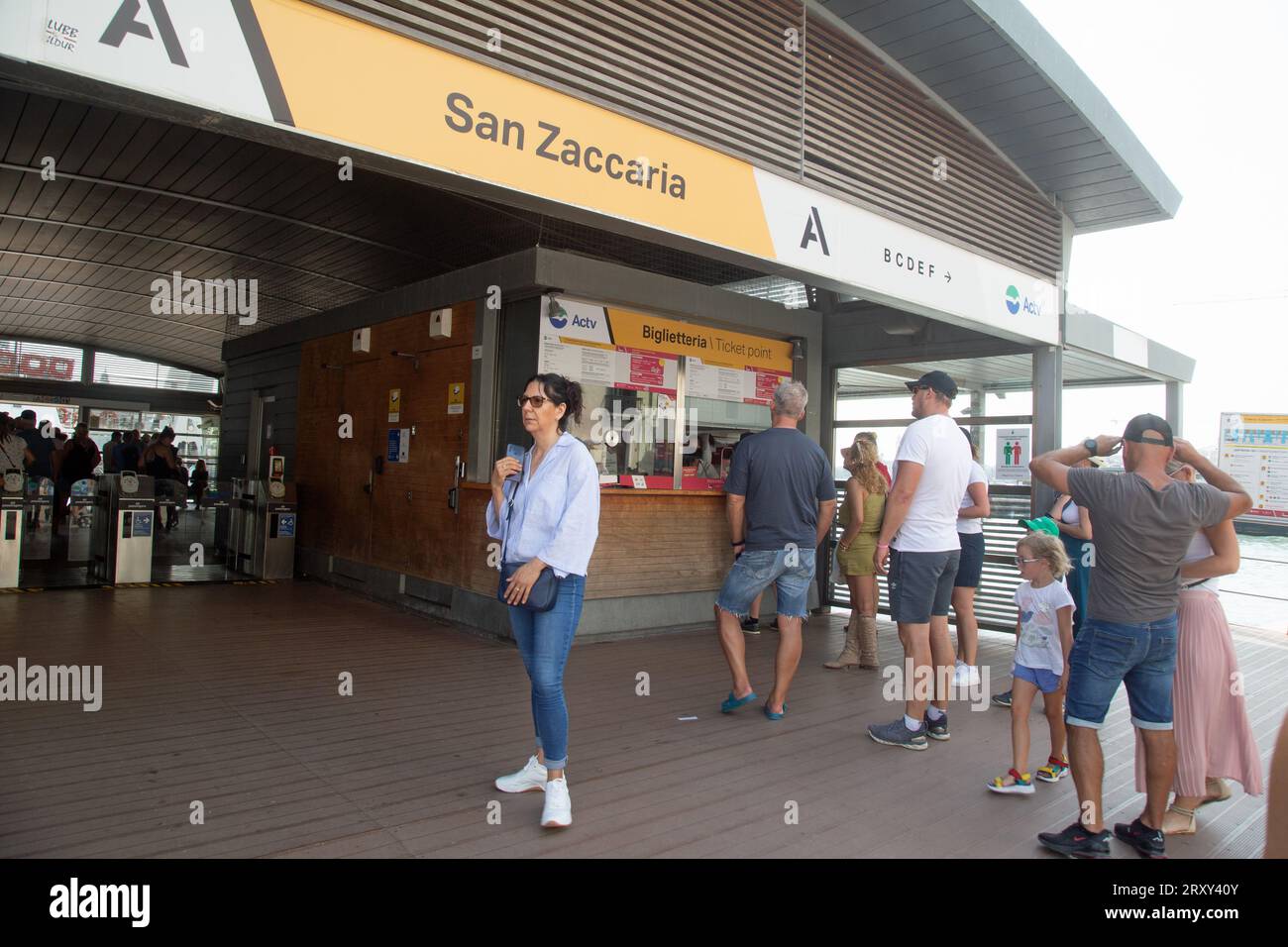 San Zaccaria, Venice, Italy, September 2023, people line up to buy tickets for the vaporetto water bus Stock Photo