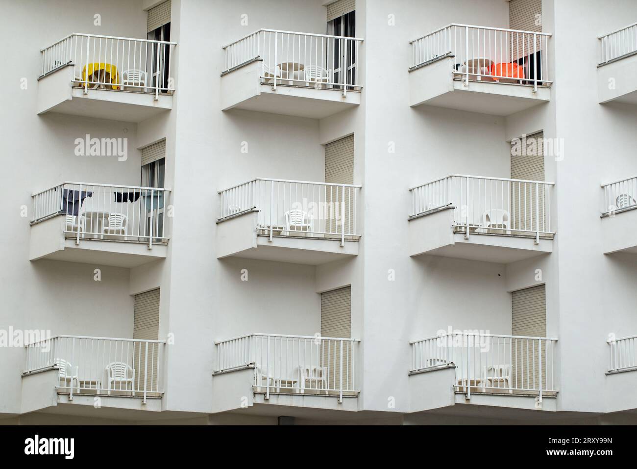 Close up landscape format shot of balconies on a modern white painted ...