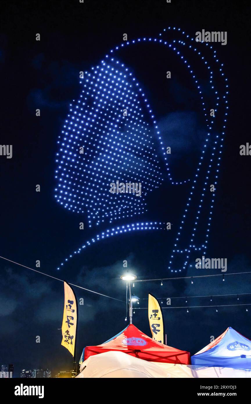 Drones light show forming a human picture in space, over Victoria Harbour in Hong Kong. 800