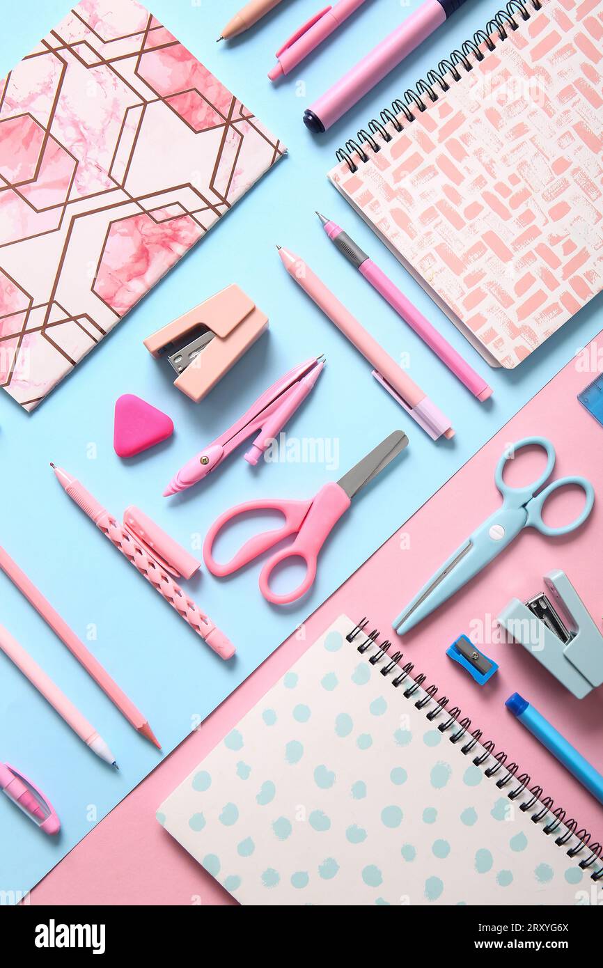 Different school stationery and notebooks on colorful background Stock ...