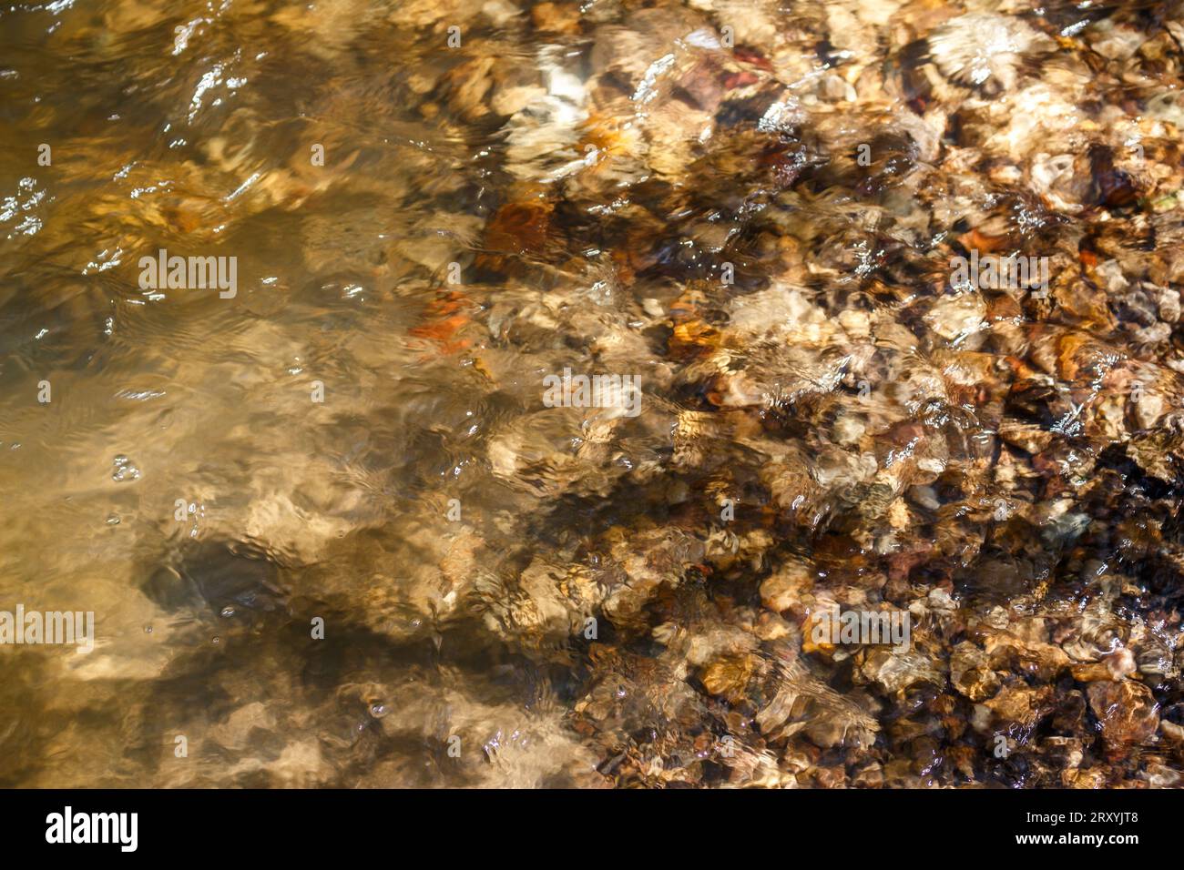 Stream Water Ripples Running colorful ripples on water hi-res stock photography and images ...