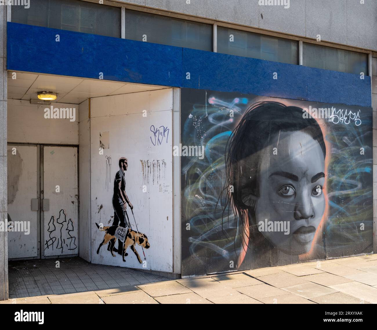 1 September 2023. Union Street,Aberdeen,Scotland. This is street art on a vacant shop premises in Union Street in Aberdeen. It contains a woman and a Stock Photo