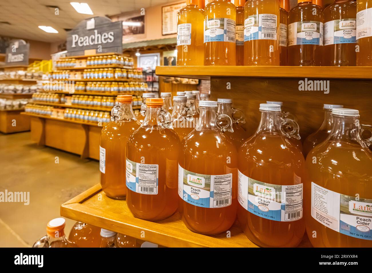 peach cider, bottled peaches, and pecans on