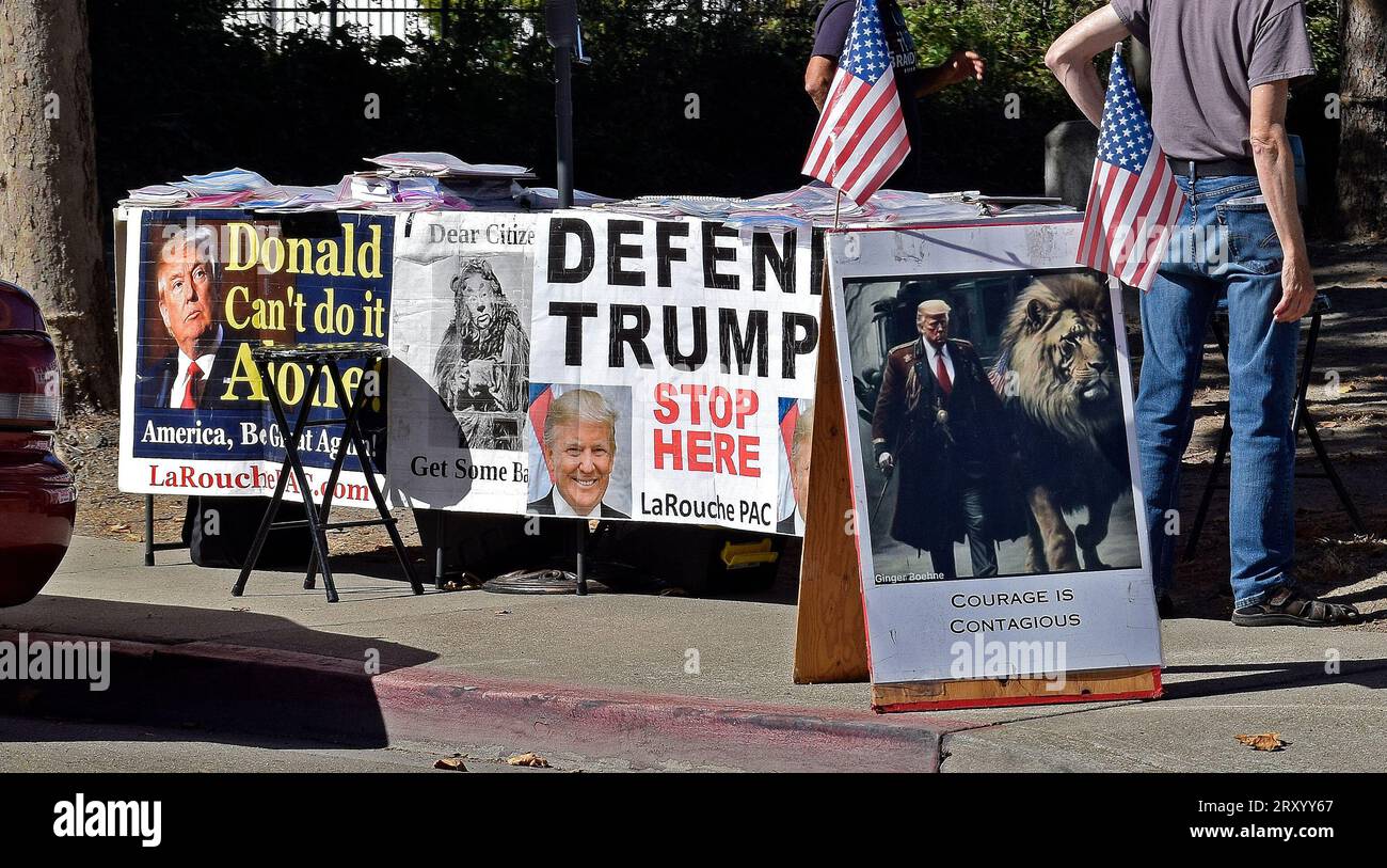 support and defend  ex President, Donald Trump table set up on sidewalk in Alameda County, California Stock Photo