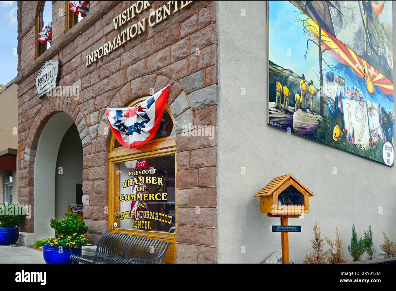 The Prescott Arizona Chamber of Commerce and Visitor Information Center building with murals and signage in downtown Prescott, AZ Stock Photo