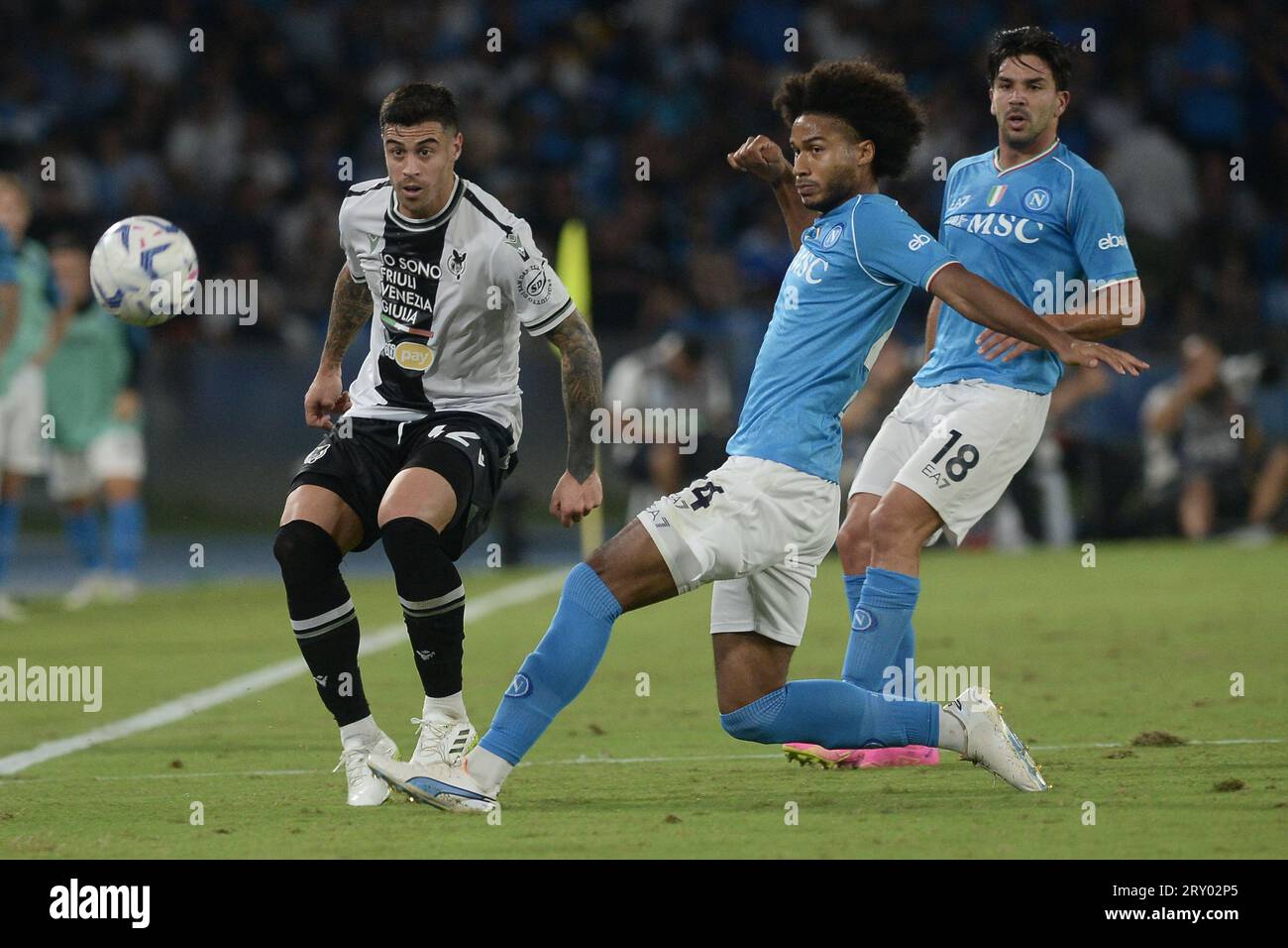 Jens-Lys Cajuste of SSC Napoli competes for the ball with Milan