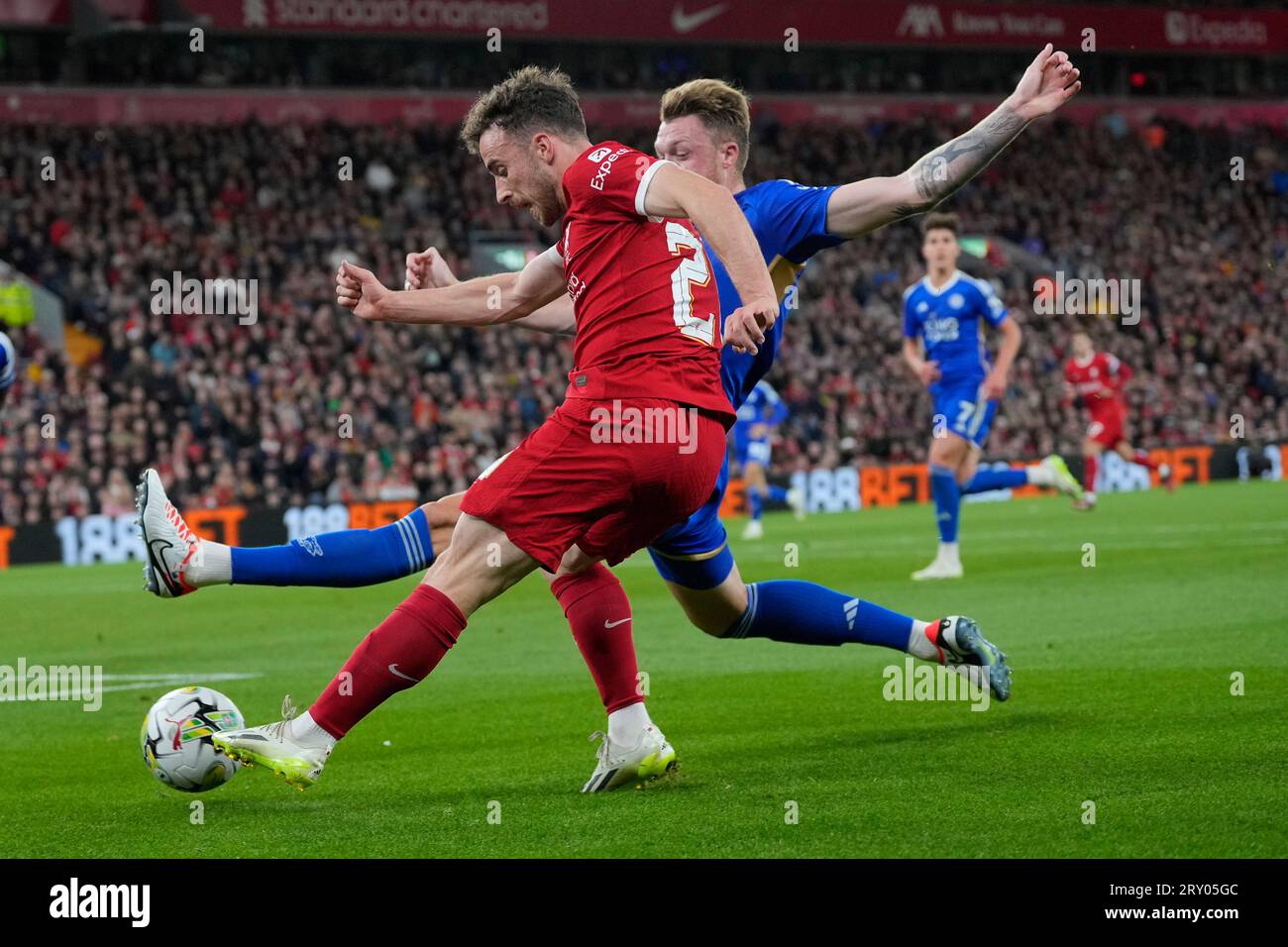 Diogo Jota #20 of Liverpool crosses under pressure from Harry Souttar ...