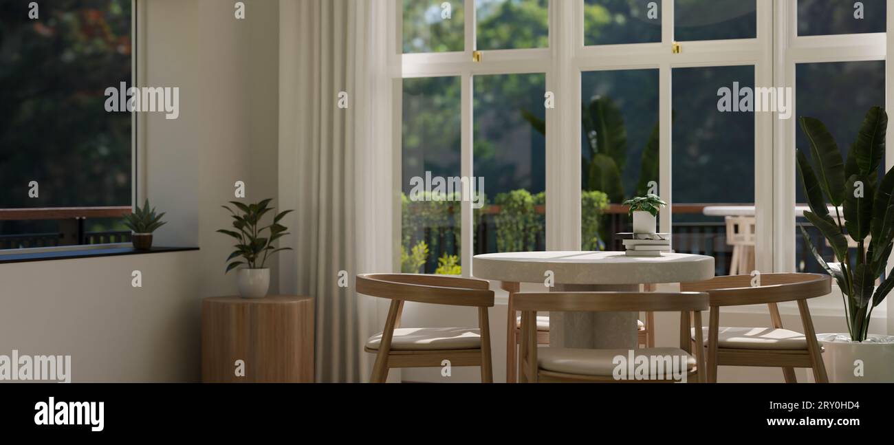 Interior design of a cosy modern dining room with a dining table by the ...