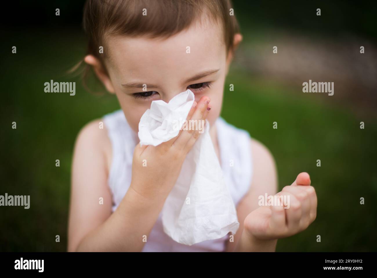 small child with allergies during fall allergy season Stock Photo