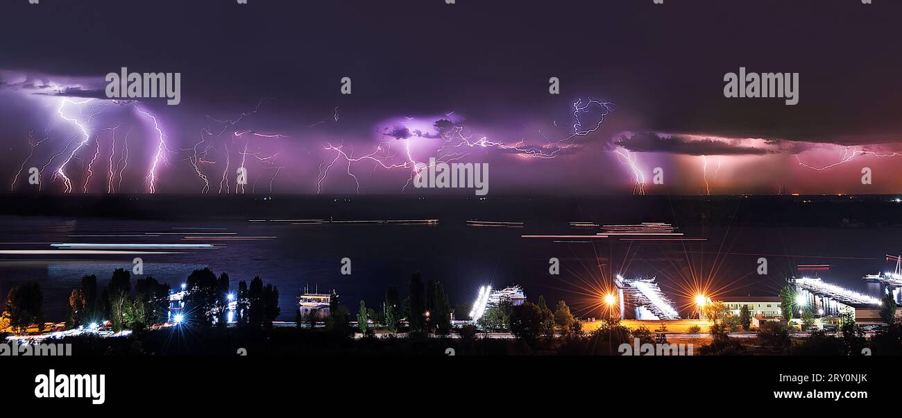The Volga River in flashes of a lot of night lightning Stock Photo