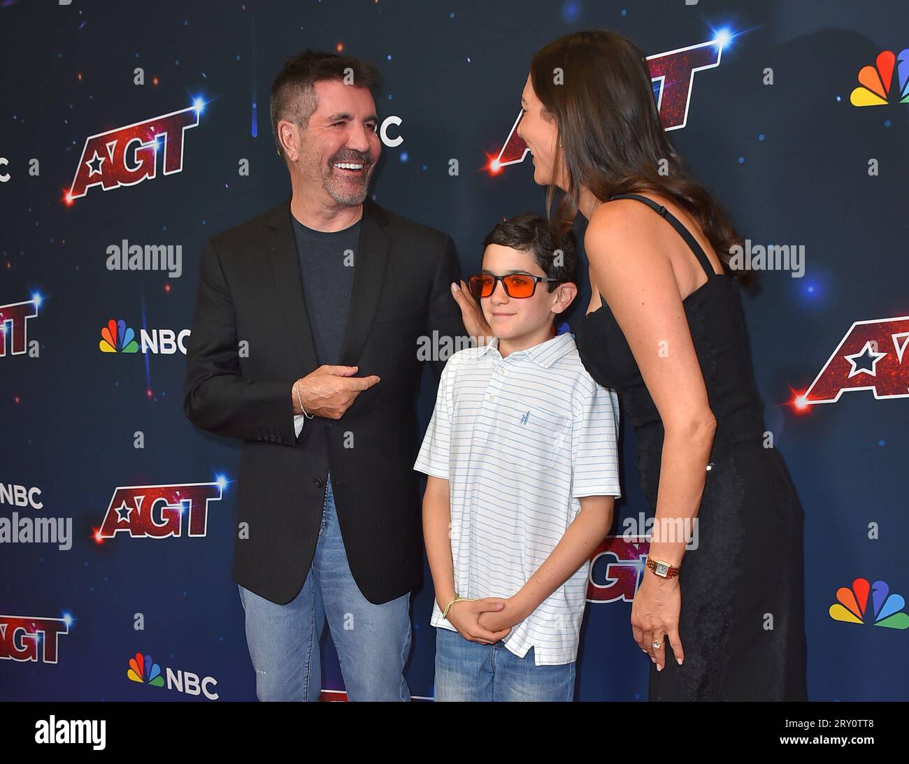 Simon Cowell, from left, Eric Philip Cowell and Lauren Silverman arrive
