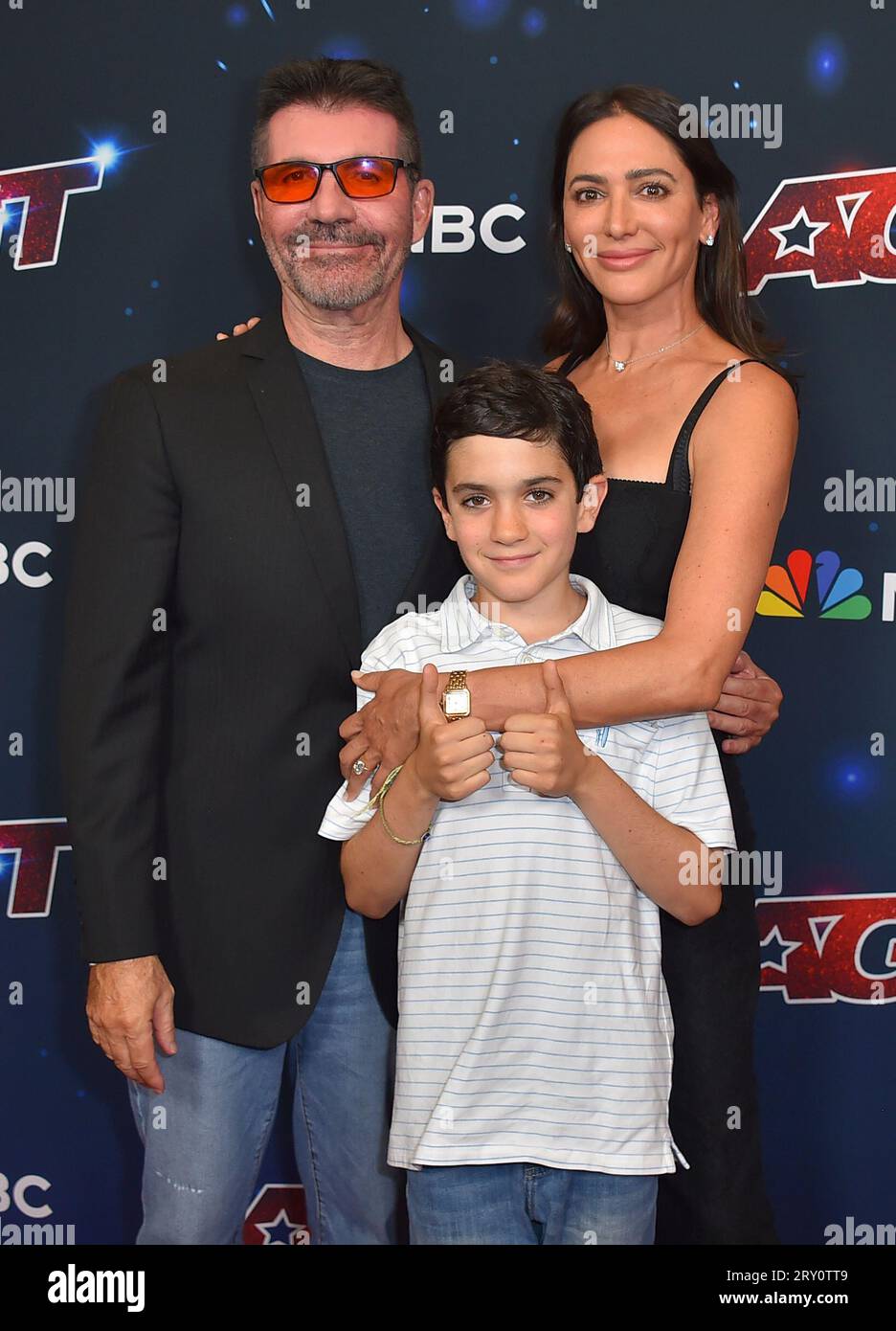 Simon Cowell, from left, Eric Philip Cowell and Lauren Silverman arrive