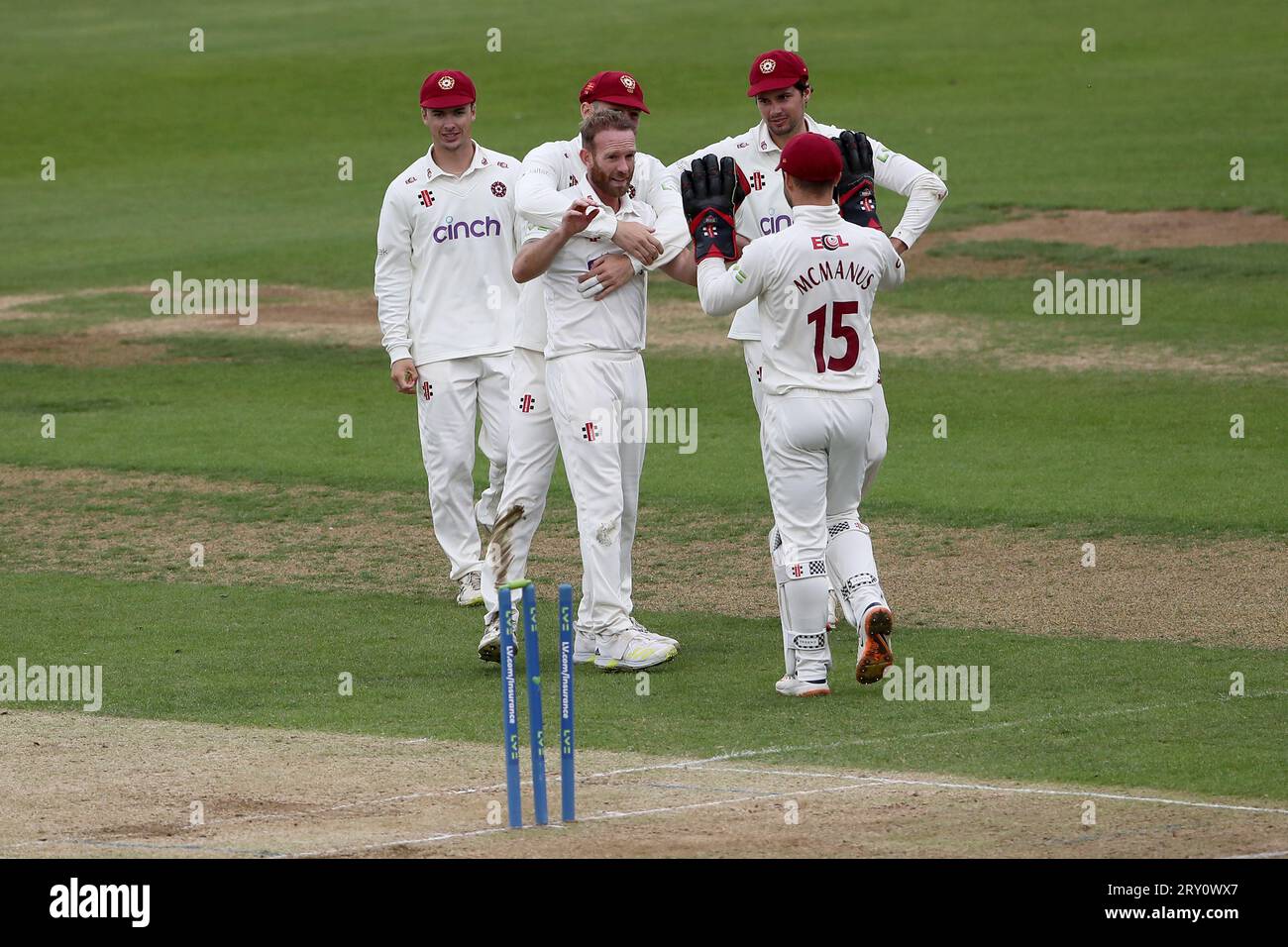 Luke Procter of Northamptonshire celebrates with his team mates after ...