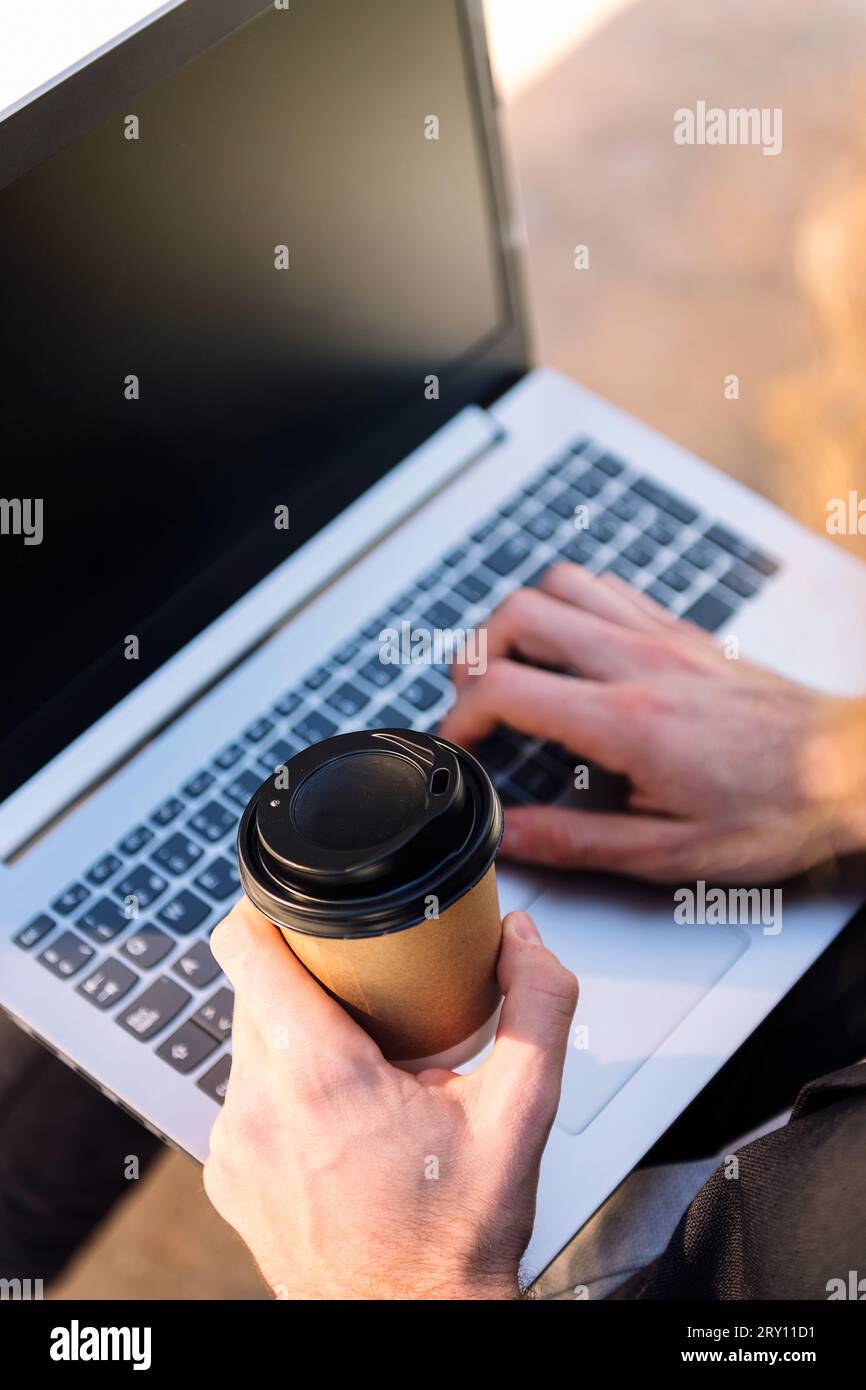 unrecognizable man working with a laptop Stock Photo