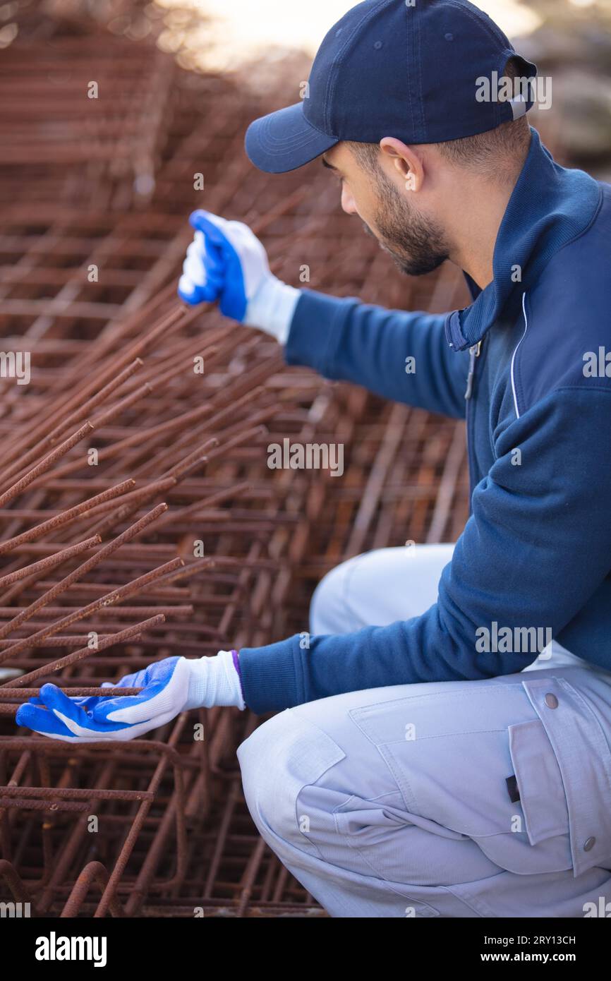 male worker working at the metal warehouse Stock Photo