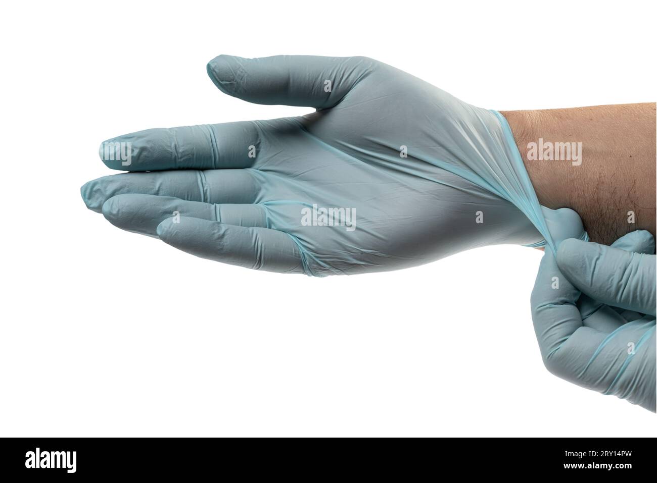 Man putting on latex gloves hi-res stock photography and images - Alamy