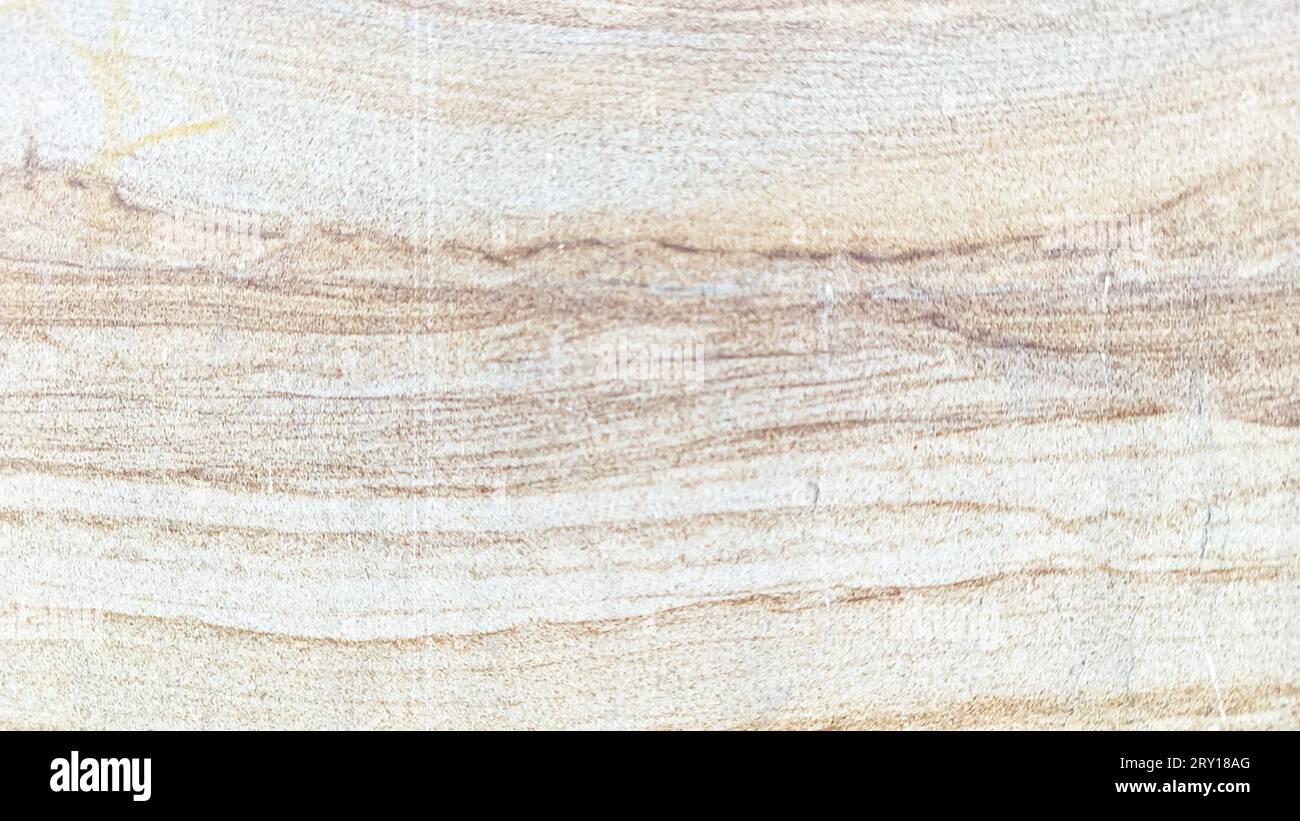 cream colored wooden background texture with a pattern of grunge striations of a natural granite stone used on the floor Stock Photo