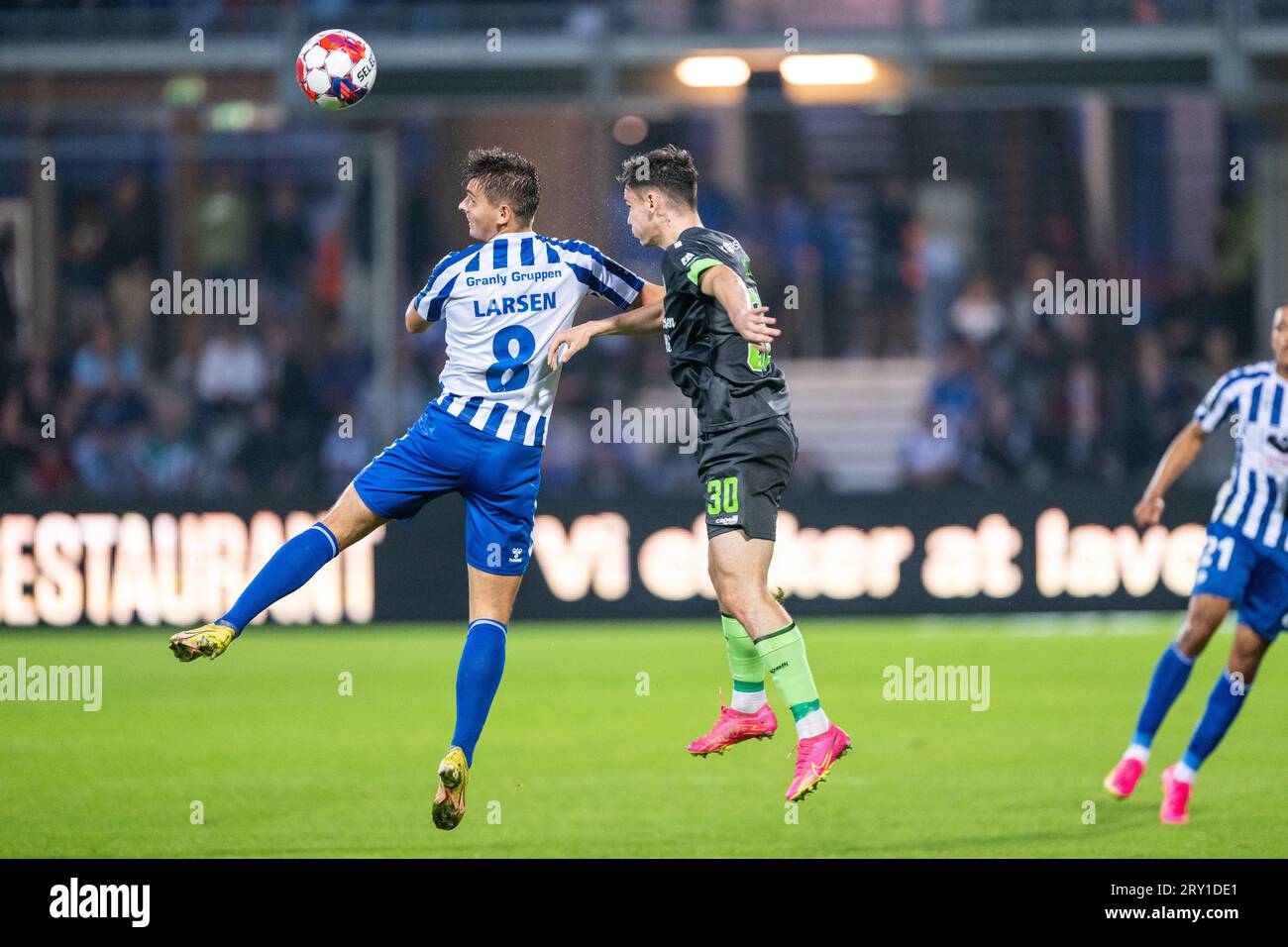 Esbjerg, Denmark. 27th, September 2023. Mads Larsen (8) of Esbjerg fB and Srdjan Kuzmic (30) of