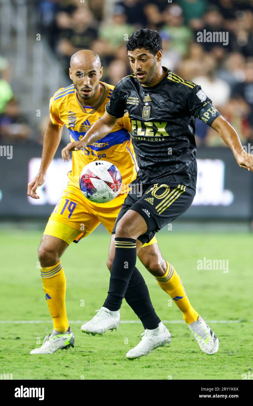 Los Angeles FC's Carlos Vela (R) and Tigres’ Guido Pizarro (L) in actions during the Campeones Cup between the Los Angeles FC and Tigres UANL at BMO Stadium. Tigres UANL won 4-2 on penalties. Stock Photo