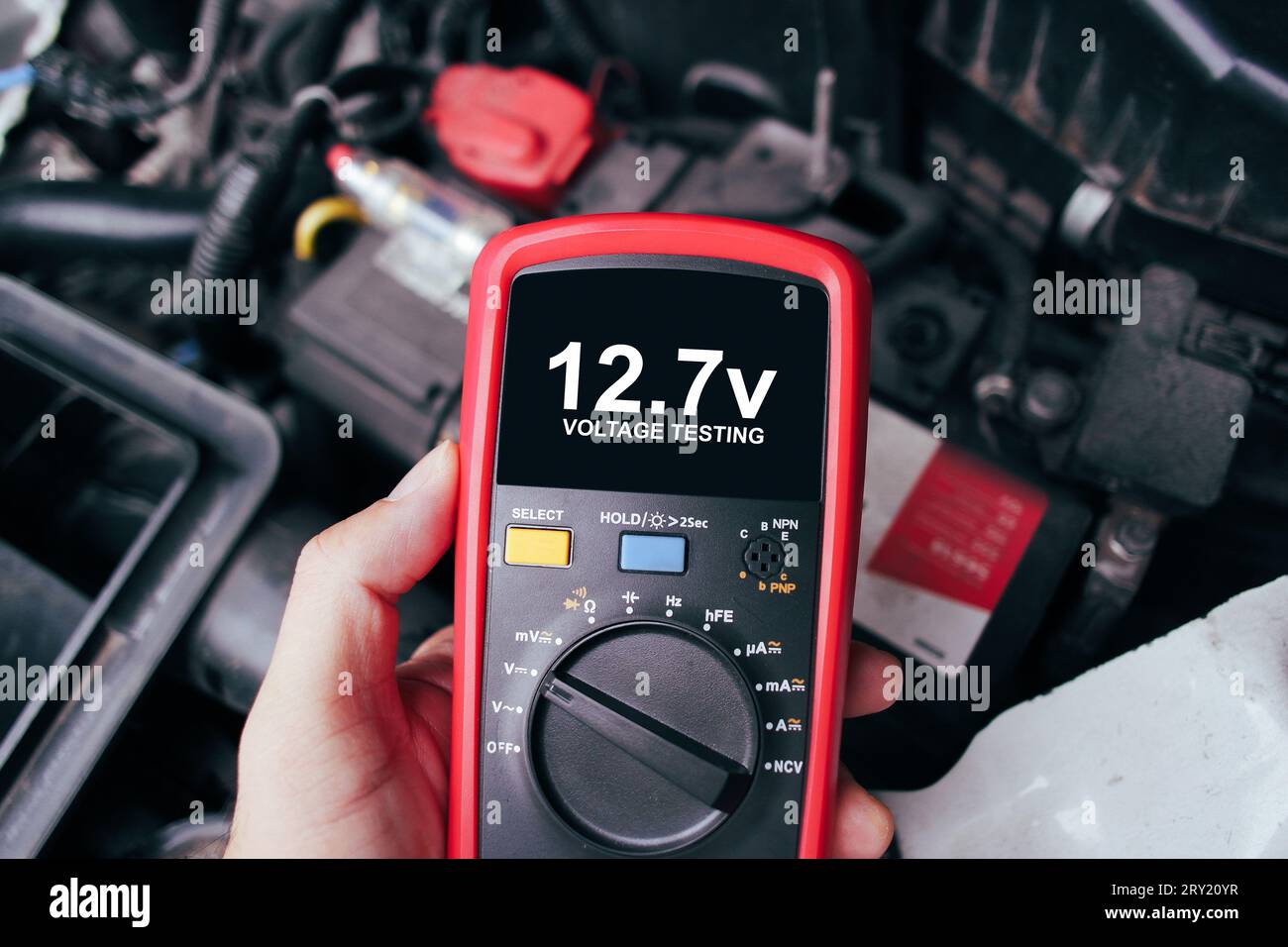 Car battery voltage testing with a digital multimeter by auto ...