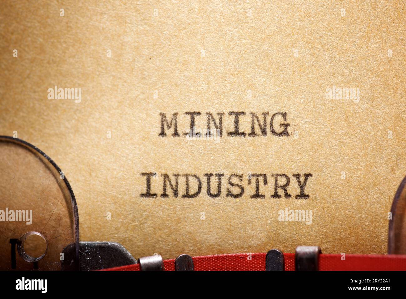 Mining industry text written with a typewriter Stock Photo - Alamy