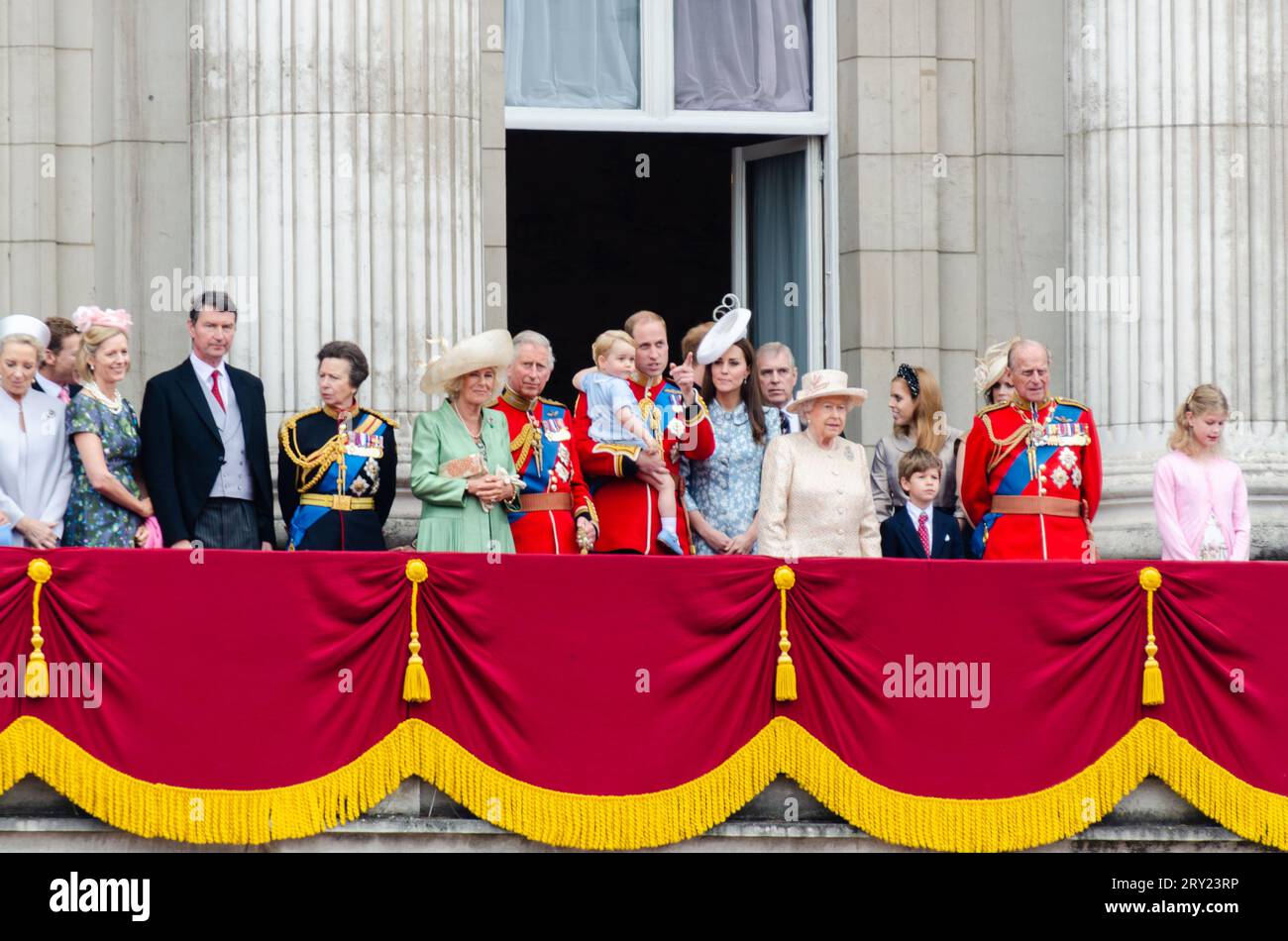 Royal Family on the balcony for the Queens Birthday Flypast after Trooping the Colour 2015 in London. Royals. Prince William carrying Prince George Stock Photo