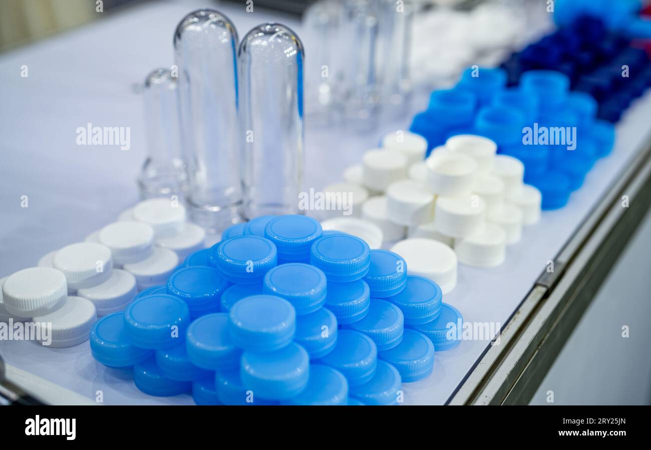 Pile of plastic screw caps. Caps packaging concept. Bottle caps and closures packaging design