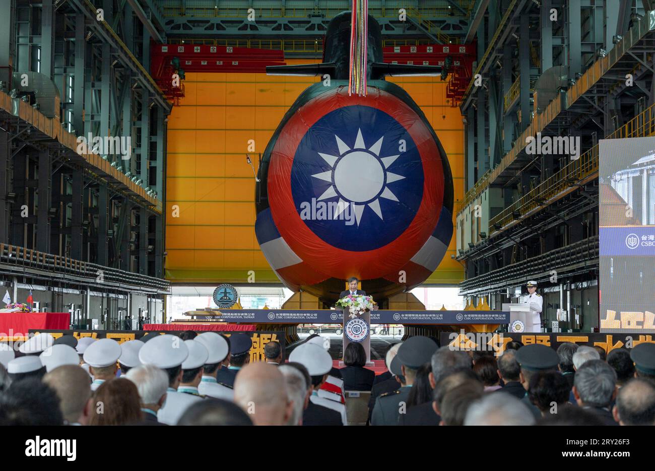 Kaohsiung, Republic of China. 28 September, 2023. CSBC Chairman Cheng Wen-lon delivers remarks during the launch of the first domestically-made Hai Kun-class diesel-electric submarine ROCS Hai Kun at the CSBC Corporation shipyard, September 28, 2023 in Kaohsiung, Taiwan.  Credit: Wang Yu Ching/ROC Office of the President/Alamy Live News Stock Photo