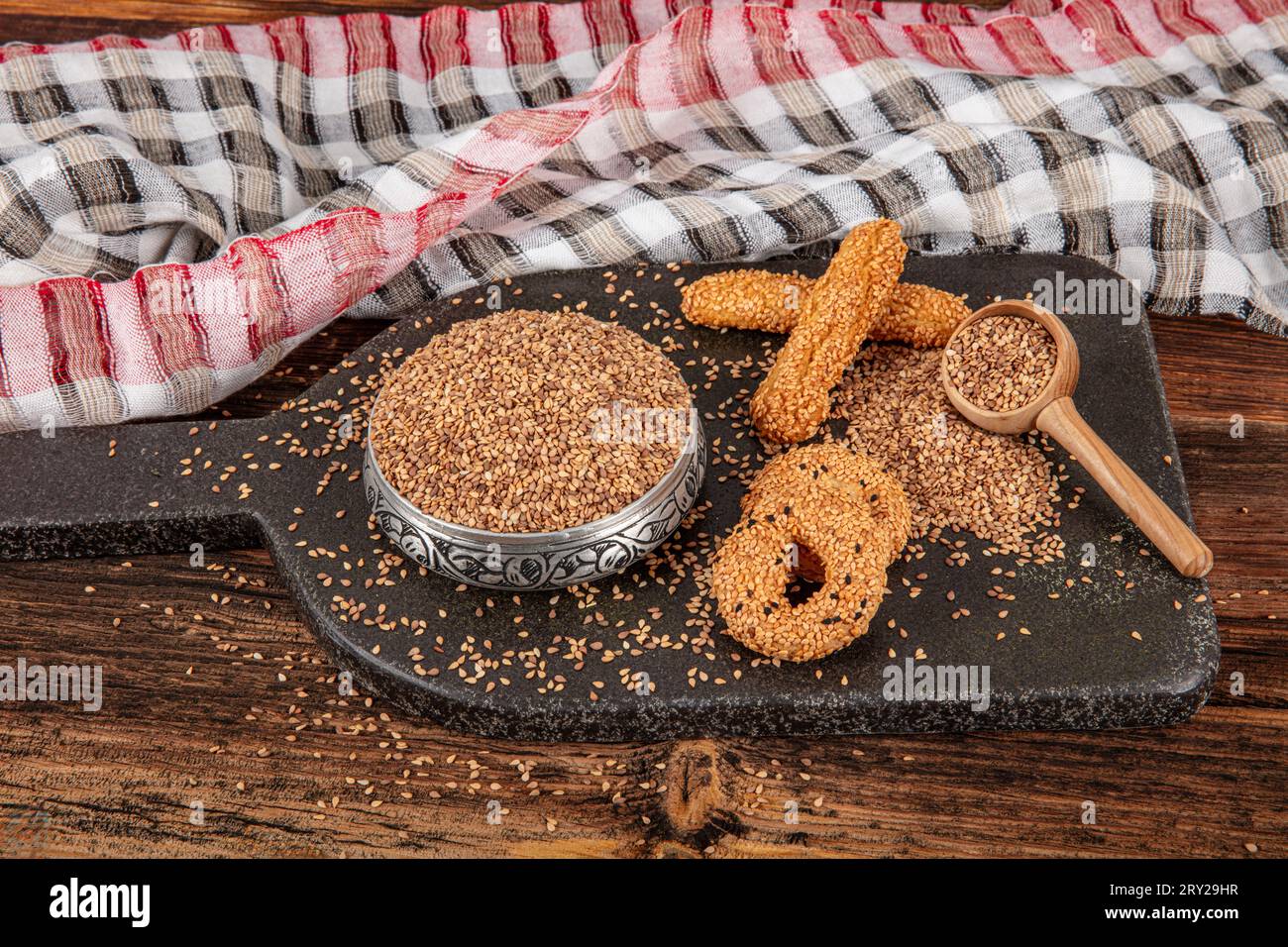 Roasted sesame seed. Pile of sesame seeds as background, spice or ...