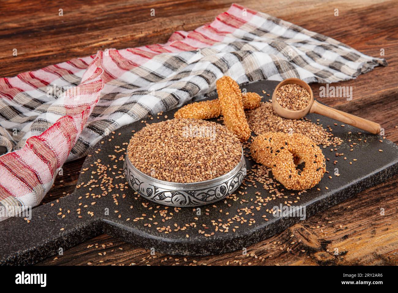 Roasted sesame seed. Pile of sesame seeds as background, spice or ...