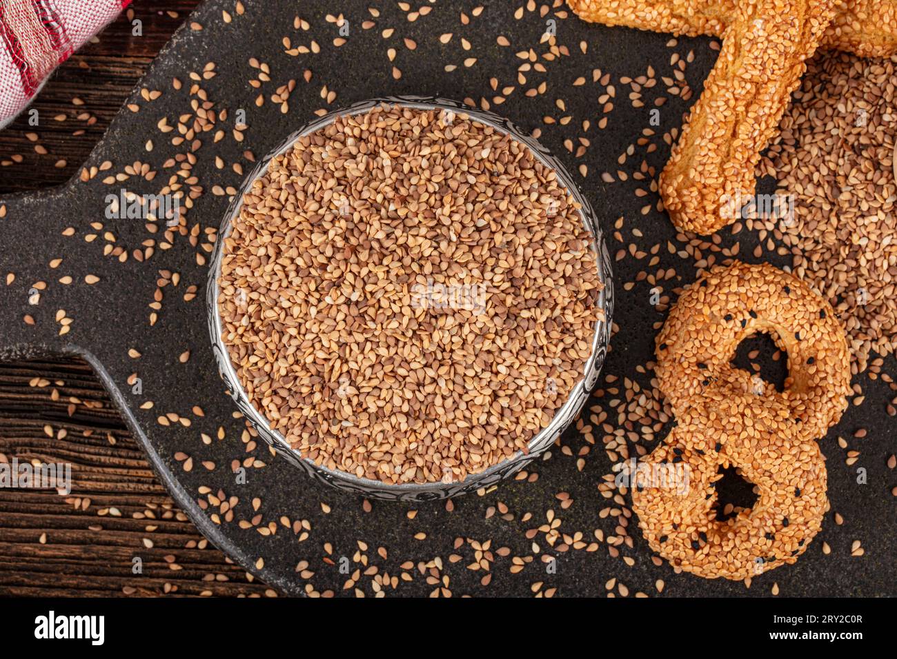 Roasted sesame seed. Pile of sesame seeds as background, spice or ...