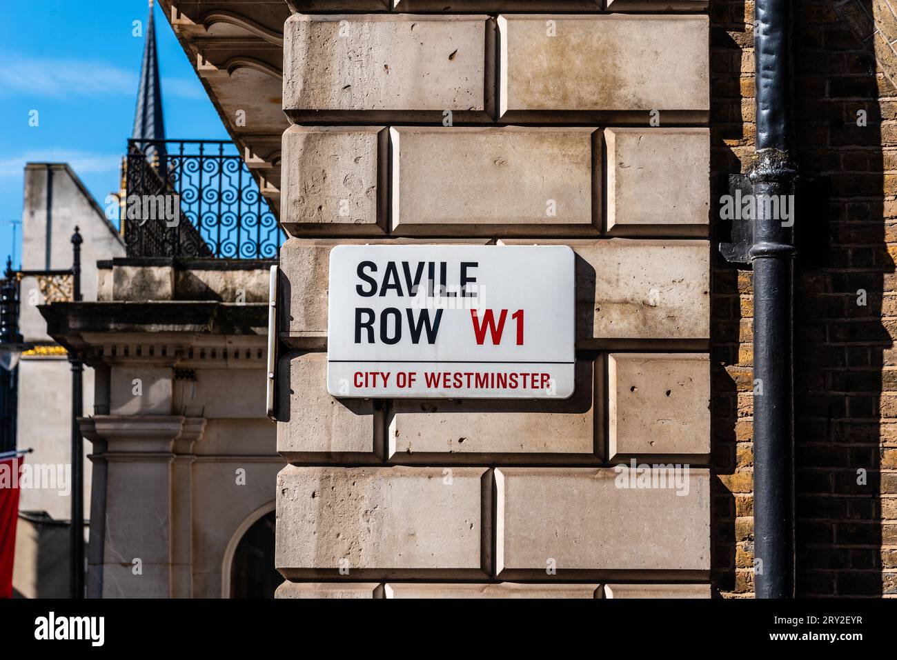 London, UK - August 27, 2023: View of Savile Row Street name sign ...