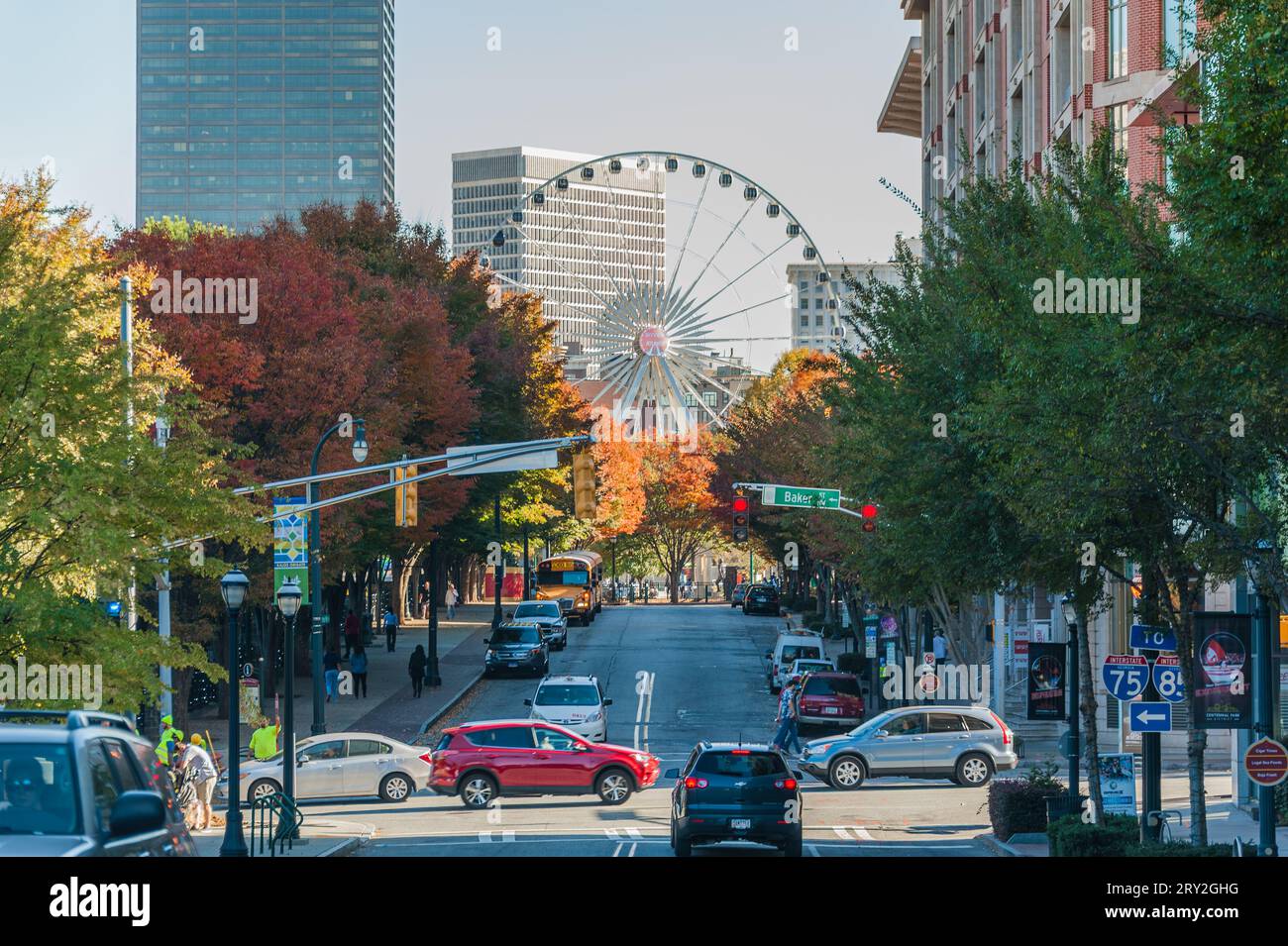 View of Downtown Atlanta, Georgia, with Skyview Atlanta ferris wheel and colorful autumn trees. (USA) Stock Photo