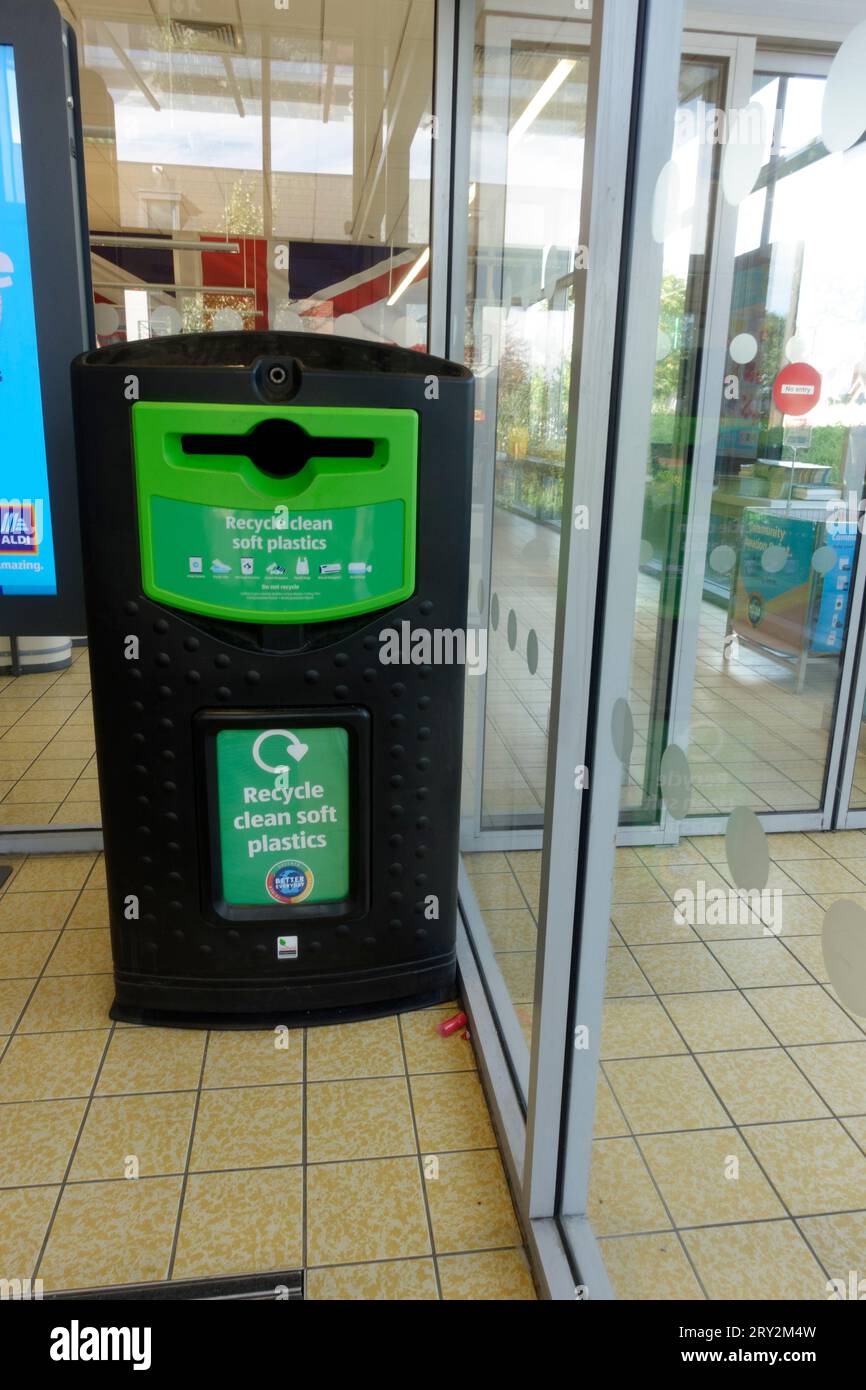 Recycling soft plastics bin at entrance to Aldi Stratford UK Stock Photo