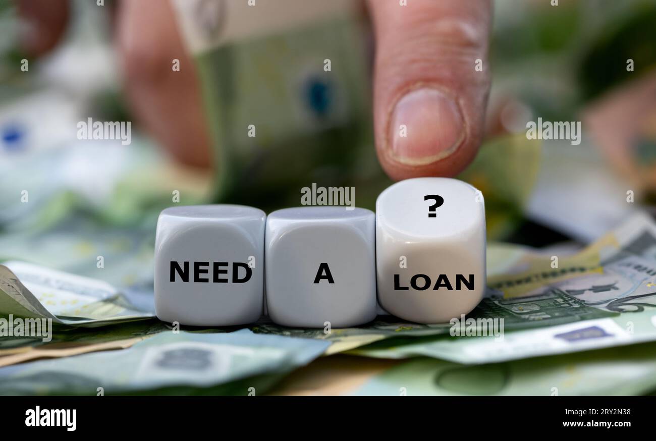 Dice form the question 'need a loan?'. Stock Photo